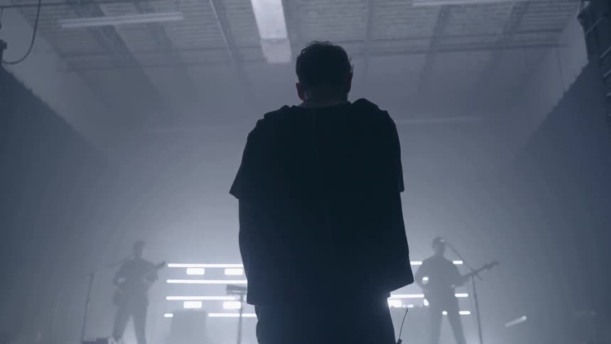 A band practices on stage