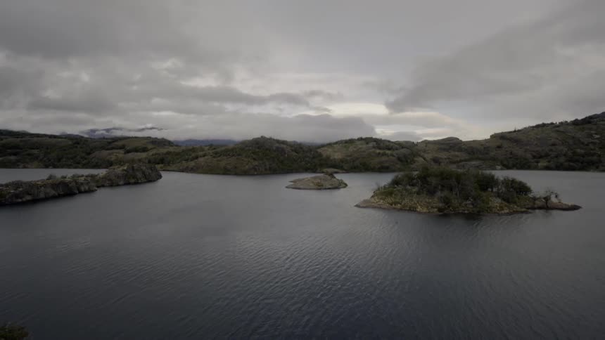 Landscape of small islands with rolling hills on a cloudy day