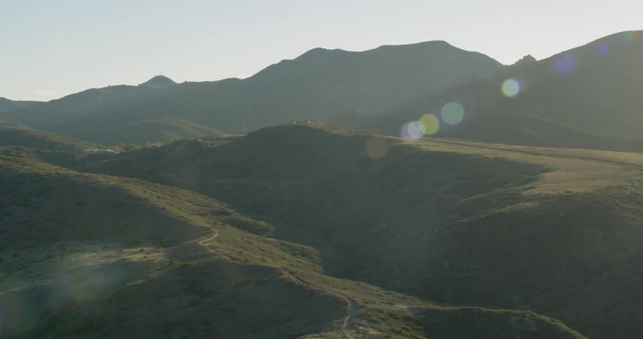 Many hills with shadows from the sun