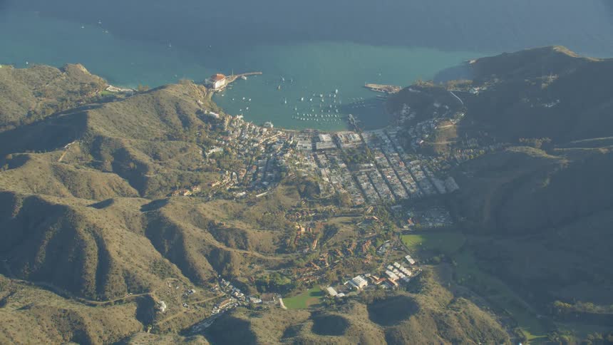 Town nestled in between mountains on the coast