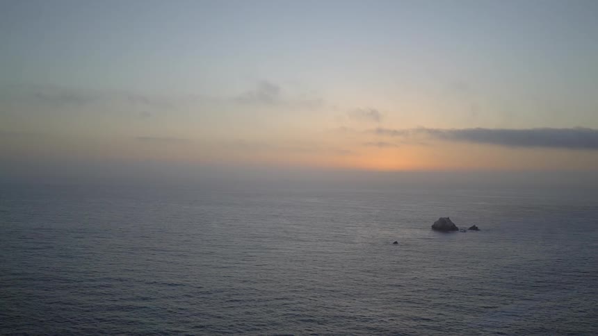 The sun goes down over the ocean