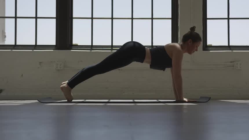 A woman stretching in numerous yoga poses