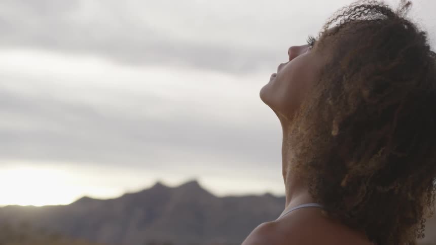 Girl taking a deep breath