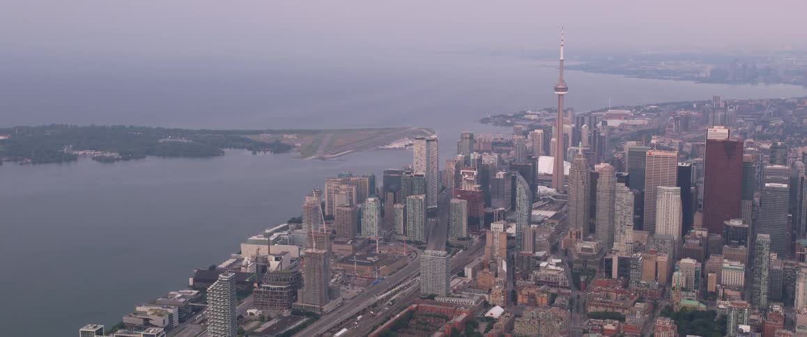 A city stands alongside an ocean