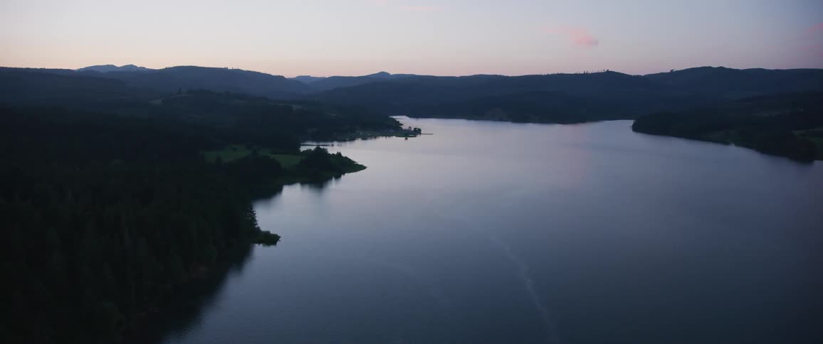 Landscape of a lake with forest area on both sides