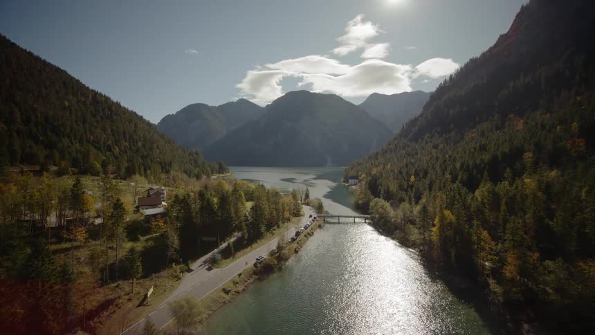 Community bordered by river and mountains