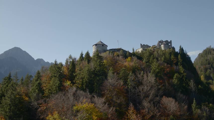 A castle sits on top of a hill