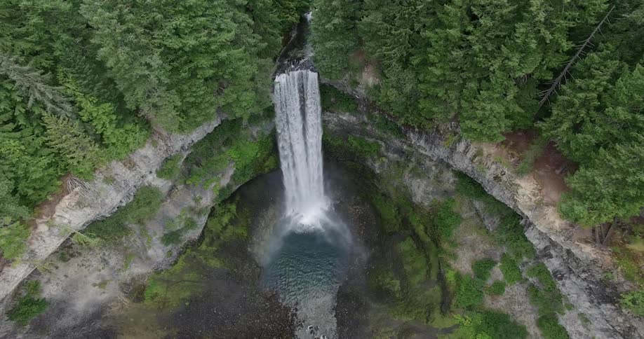 Water pouring down a forest waterfall
