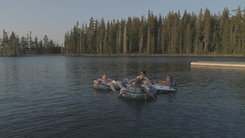 Males floating in river