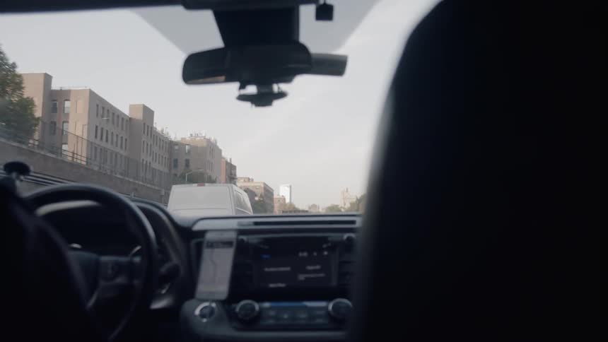 A car driving down a freeway
