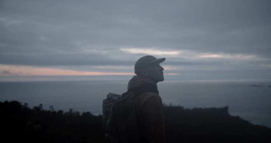 Man walking thru hills