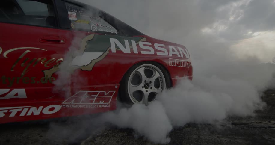 Race car burning rubber