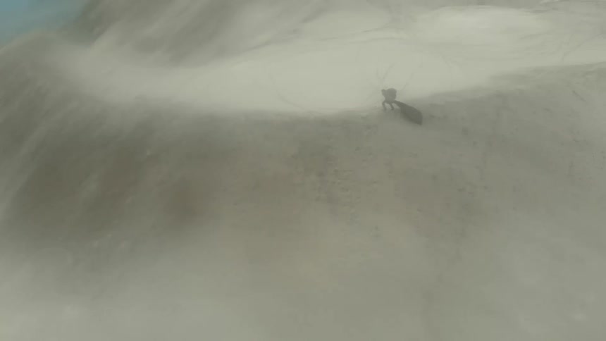 A person climbs a cloud enshrouded mountain and runs along a ridge