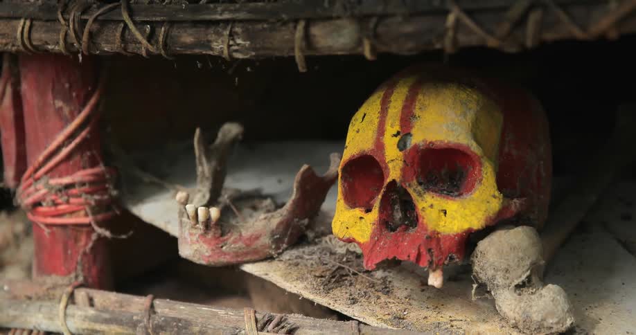 Red and yellow painted skull