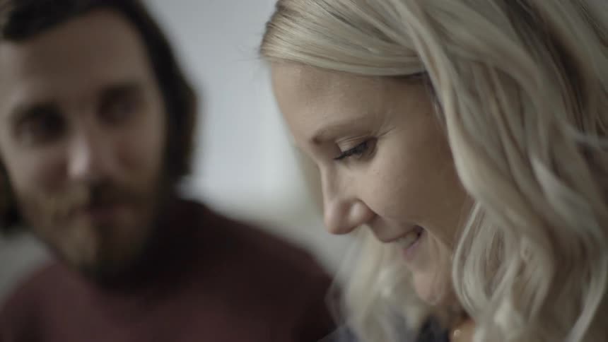 Two people laughing