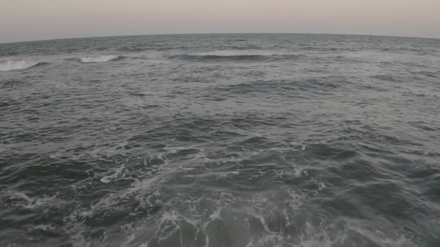 Waves that are crashing against the shore