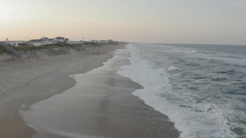 A narrow beach in the evening