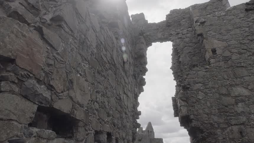 The stone walls and buildings of an ancient ruin