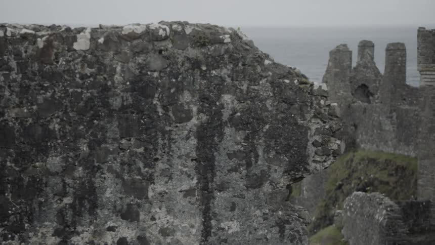 Ruins of a fortification on a cliff near the sea