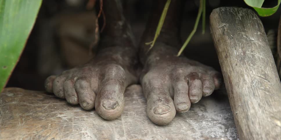 Close up of dirty feet