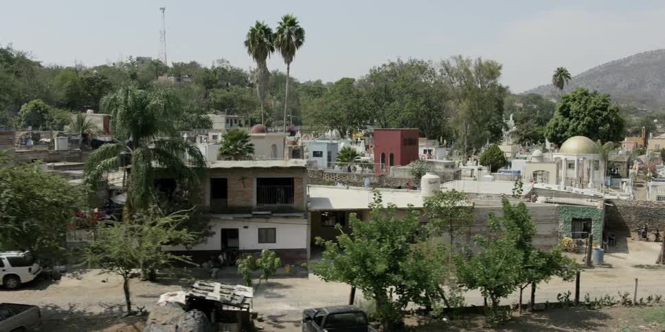 Camera looks over residential area of a city