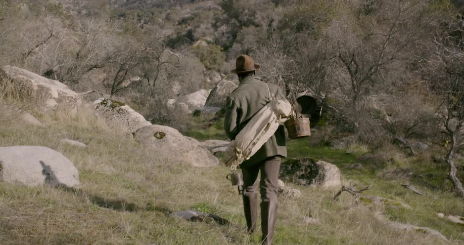 A man walking down a path