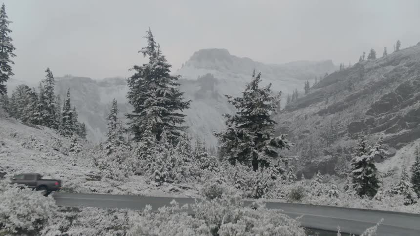 The mountain range is covered with snow