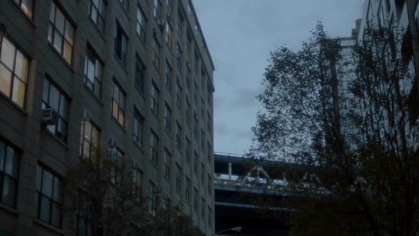 A building is shown at dusk