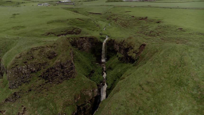 Slow falling waterfall in a remote area