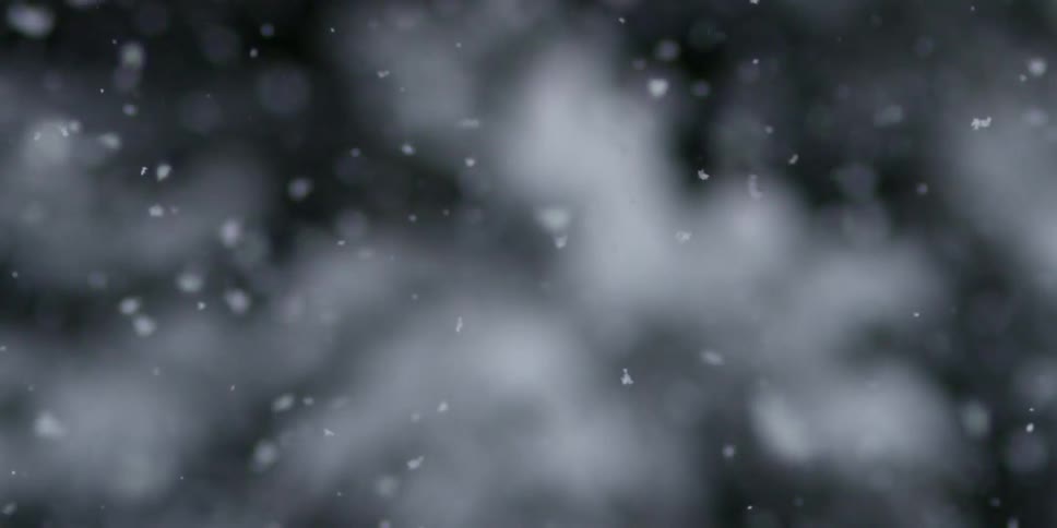 Snow falling onto the ground
