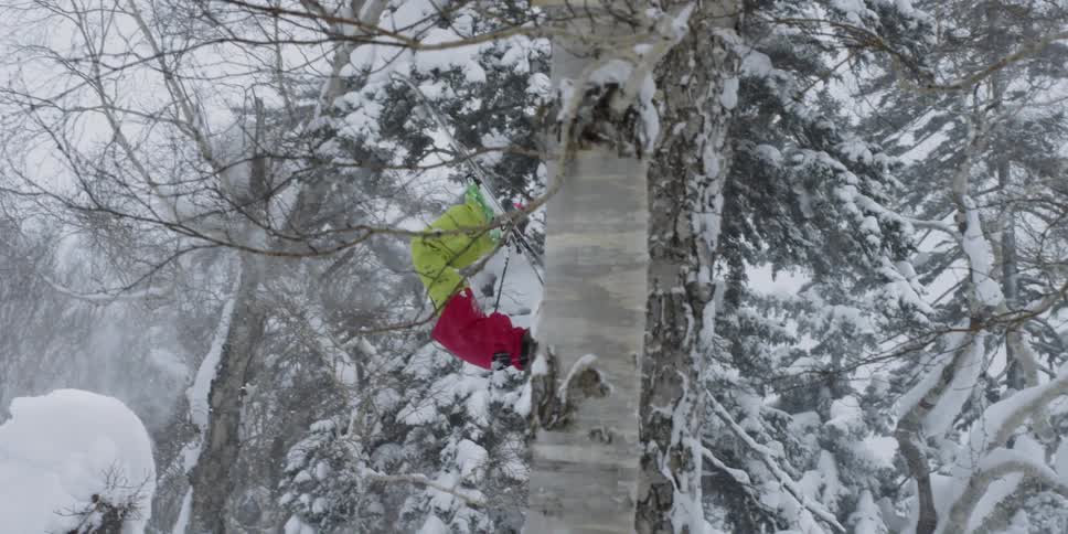 A person skiing down a slope