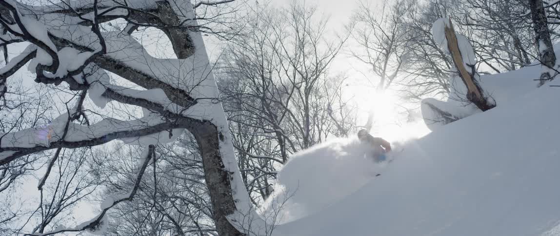 A man skiing down a hill