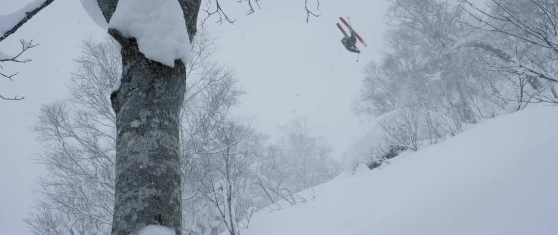 A man skiing down a slope