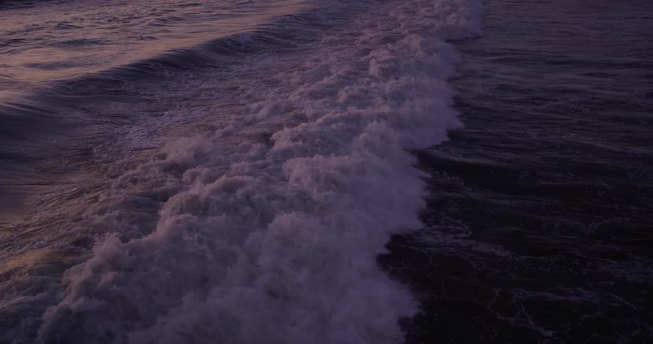 Waves crashing towards the shore