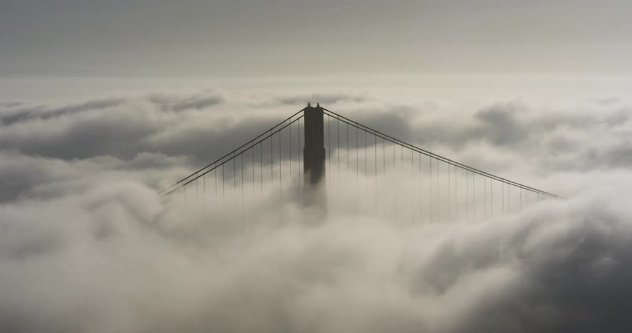 Clouds floating over a bridge