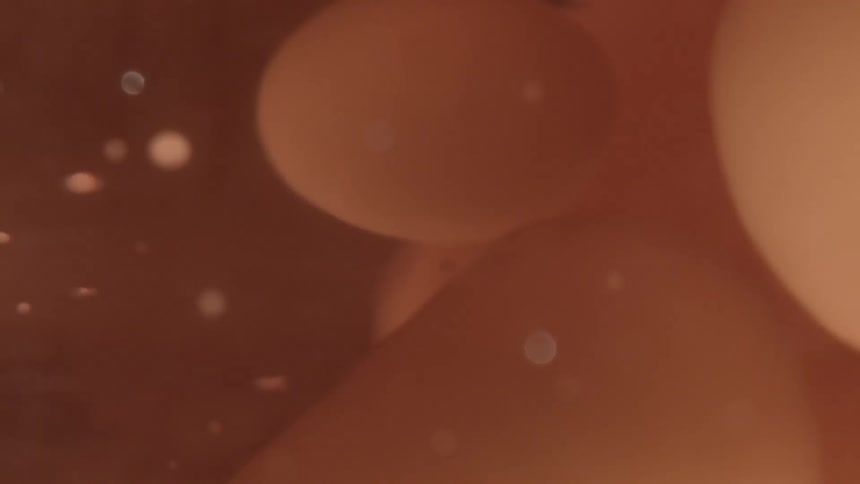 Abstract close up of what looks like the liquid and wax in a lava lamp