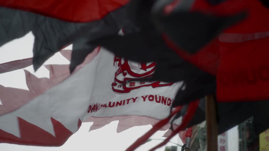A bunch of flags waving in the wind