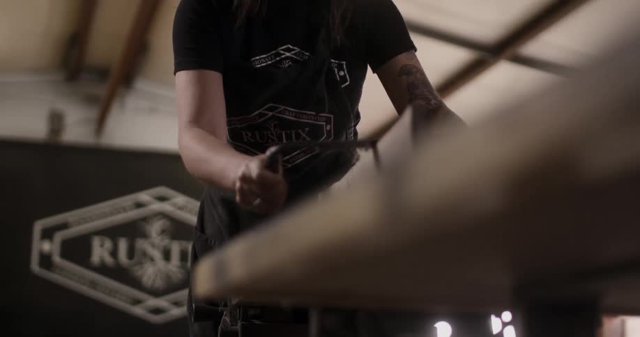 A man works with wood