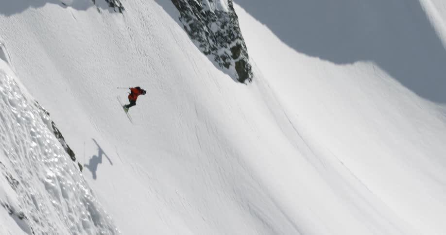 A man skis down a mountain