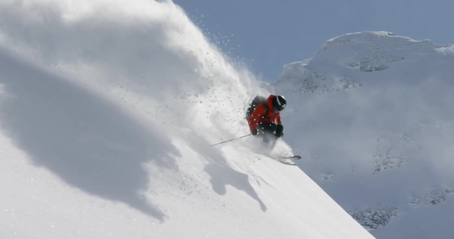 A skier jumps through the snow