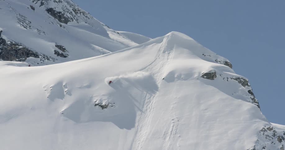 Skiing down the large mountain