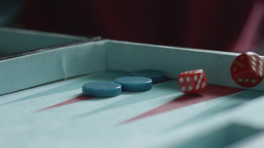 Dice thrown to the other side of the game box