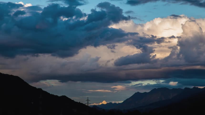 Clouds over a mountainous countryside
