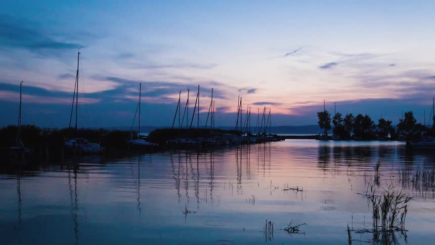 Time lapse of small boats pier