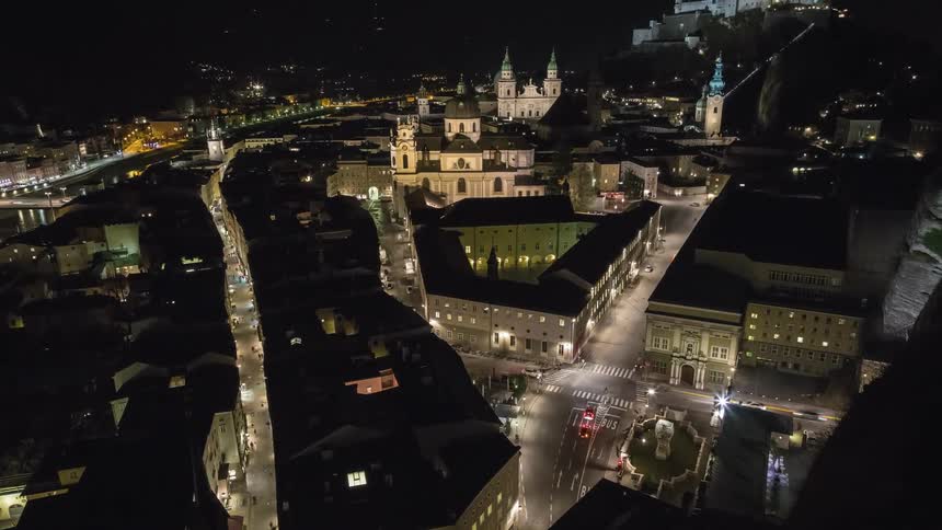 Aerial time lapse view of a busy city intersection