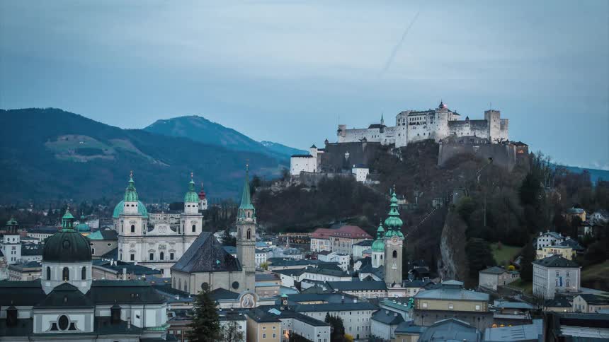 Timelapse of a castle overlooking a city