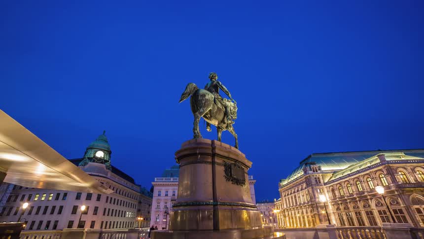 A man and horse statue in the town center