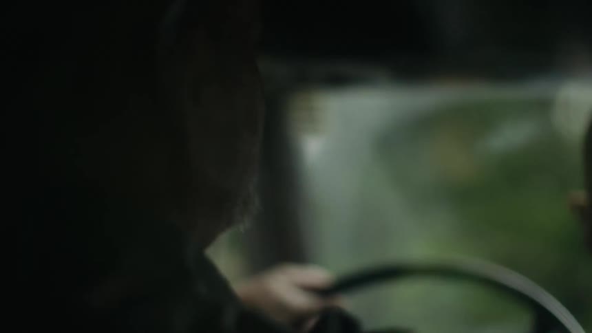 Couple driving on a narrow bridge being stopped at gunpoint in the jungle