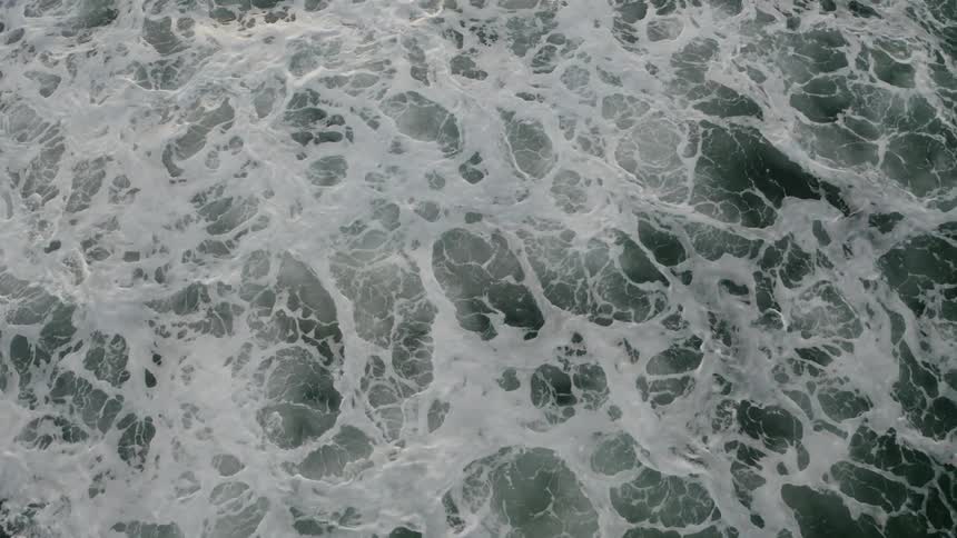 Waves crash in an ocean