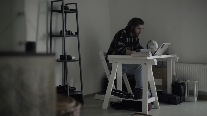 A man working at a laptop